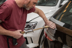 Read more about the article The Science Behind Paintless Dent Repair: How It Works and When to Use It