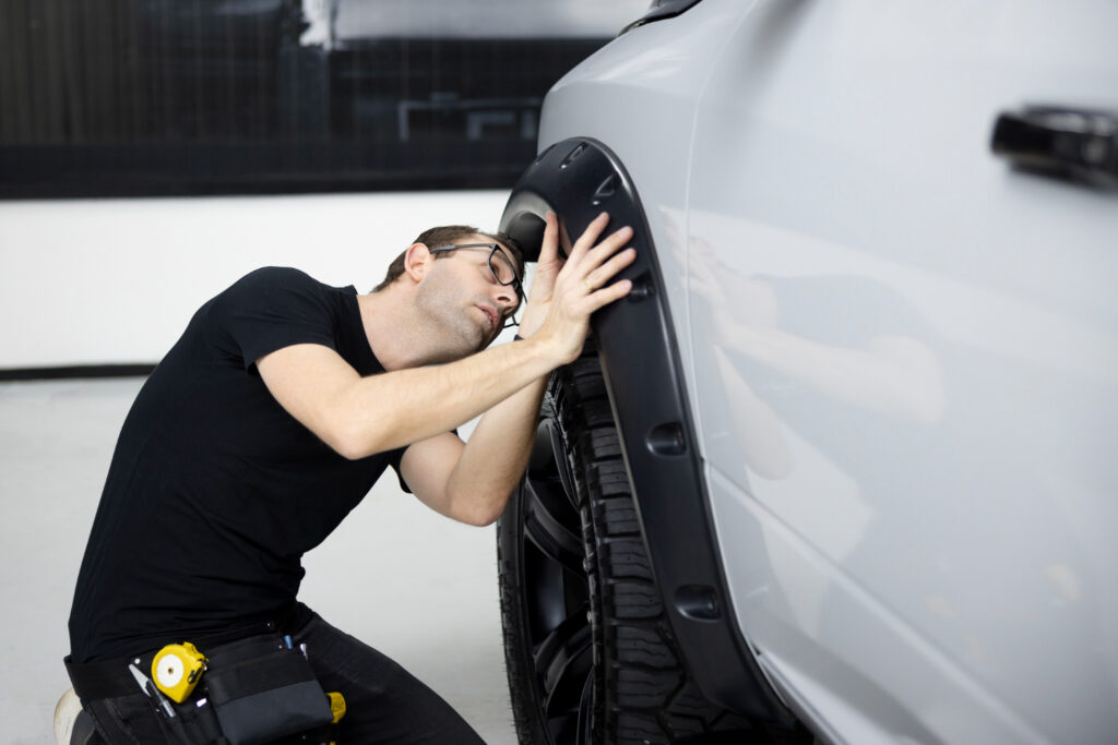 Auto body shop repairing car after accident