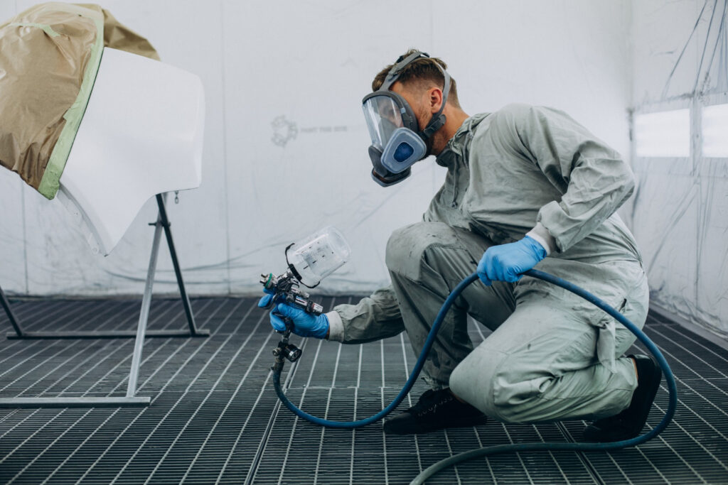 Realistic image illustrating professional paint thickness measurements for Inland Empire Autobody & Paint